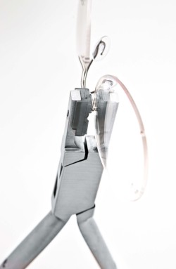 Pince à presser avec bascule